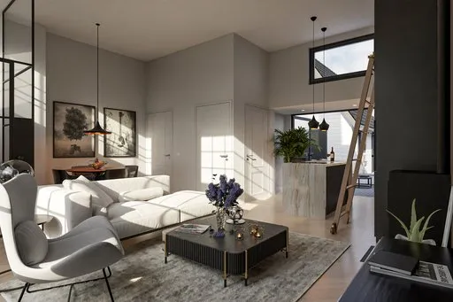 View of the living room of a luxuriously furnished townhouse.