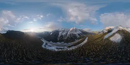 360-degree HDR panorama of snowy mountains with sunset for realistic scene lighting