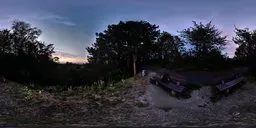 360-degree panoramic HDR overlooking trees at dusk for realistic scene lighting.