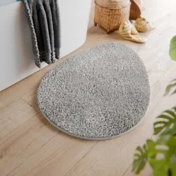 Grey oval bath mat