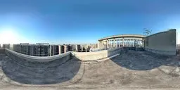 High-resolution 360-degree HDR panorama featuring sunset over urban rooftops for realistic scene lighting.