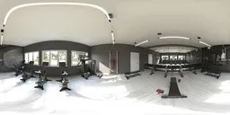 360-degree HDR panorama of a modern gym interior with equipment and natural lighting.