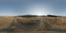 Panoramic HDR image of golden hills with a sun flare for realistic lighting in 3D scenes.