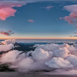 Sunset over Clouds and Mountains