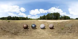 32bit HDR of sunlit dry field with clear skies and realistic shaded spheres.