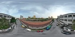 360-degree HDR panorama of a vintage urban train yard with clear sky for scene lighting.