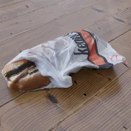 Detailed 3D scanned tofu banh mi sandwich in packaging on a wooden surface for Blender rendering.