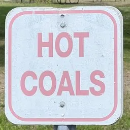 "Hot Coals Sign - A communication category 3D model created using Blender 3D software. This model features a sign that says 'Hot Coals', perfect kerning and a hot pink color scheme. Ideal for various uses including music videos, parks, and schools."