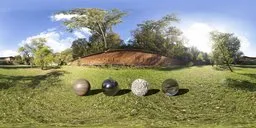 360-degree HDRI of Warsaw park with historic fortifications under clear skies, providing natural lighting for 3D rendering.