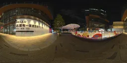 Next to the glass fence at night