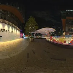 Next to the glass fence at night