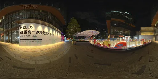 Next to the glass fence at night