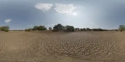 360-degree panoramic HDR featuring a dry, cracked earth texture under a sunny sky for realistic lighting in 3D scenes.