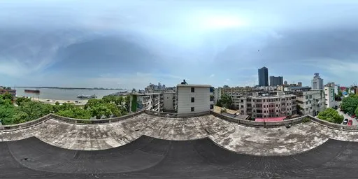 16K high-resolution HDR image featuring an urban riverside scene with old buildings against a clear blue sky ideal for scene lighting.