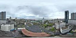 360-degree urban HDR panorama featuring cloudy skies and historic architecture for scene lighting.