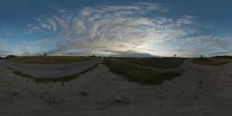 360-degree HDR panorama of an evening road under a cloud-strewn sky, for realistic lighting in 3D scenes.