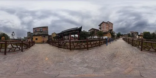 Panoramic HDR image featuring a riverside urban landscape with roads, railings, residential buildings, and lush green trees.