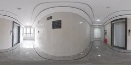 Bright modern elevator lobby interior HDR with reflective surfaces and LED lighting.