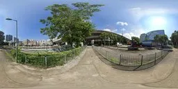 360-degree high-resolution HDR panorama featuring urban road, lush tree, and clear blue sky for realistic scene lighting.