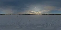 360-degree snowy landscape HDR panorama with sunset for scene illumination.