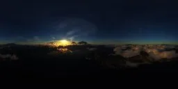 Sunrise over mountain peaks with clouds for realistic HDR lighting in 3D scenes.