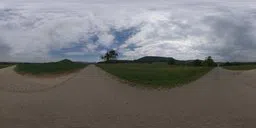 360-degree panoramic HDR lighting of a rural road with clouds and greenery for realistic scene illumination.