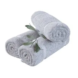 Detailed 3D model of rolled towels with olive branch, suitable for Blender, realistic texturing for serene scenes.