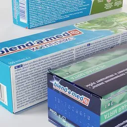 "3D model of Blend-a-med Toothpaste packaging, rendered by Roland Zilvinskis. Created with Blender 3D software, includes medical label and three boxes of dental care products."