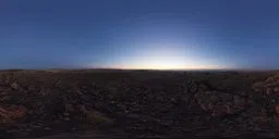 High-quality seamless HDR panorama for realistic lighting, featuring a clear sky over a rocky landscape at dusk.