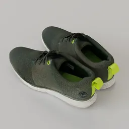 Highly detailed 3D scanned model of green sneakers with dynamic laces and vibrant heel accents – ideal for Blender rendering.