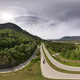 Highway in Mountain Valley Landscape