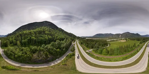 Highway in Mountain Valley Landscape