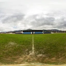 A soccer field on a cloudy day